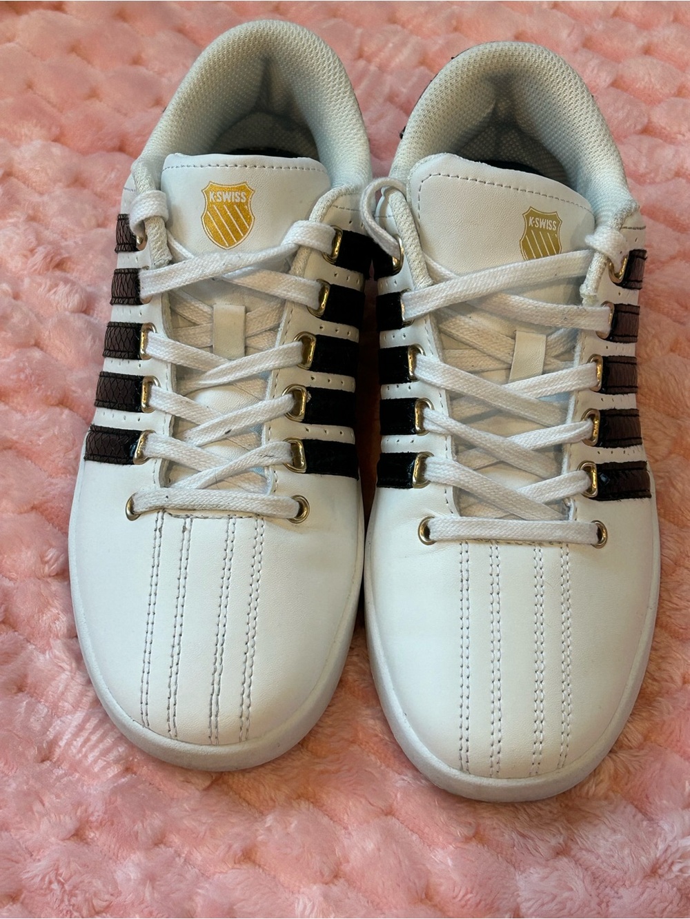 K-Swiss White Leather Sneakers with Black Stripes and Gold Crest Accents